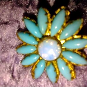This is a beautiful turquoise and opal brooch